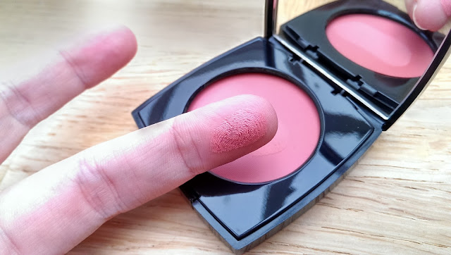 The Chanel Revelation creme blusher swatched on my finger