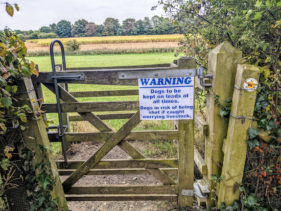 Warning sign on gate to Buntingford footpath 16