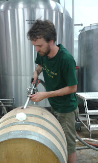 Filling the barrel with lambic wort