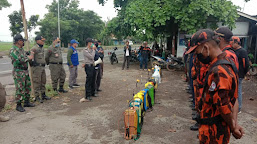 Polsek Kandanghaur Polres Indramayu Gelar Baksos Penyemprotan Disinfektan