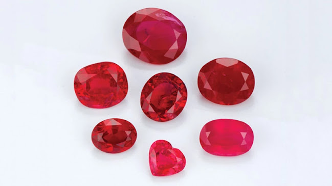 loose polished ruby stones of different color saturation