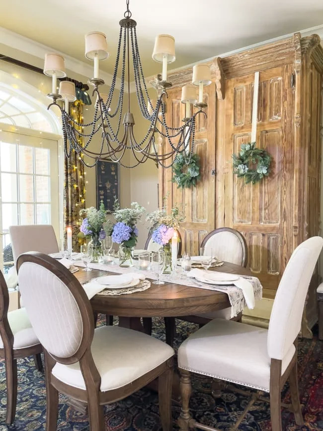 French farmhouse dining room with hydrangeas