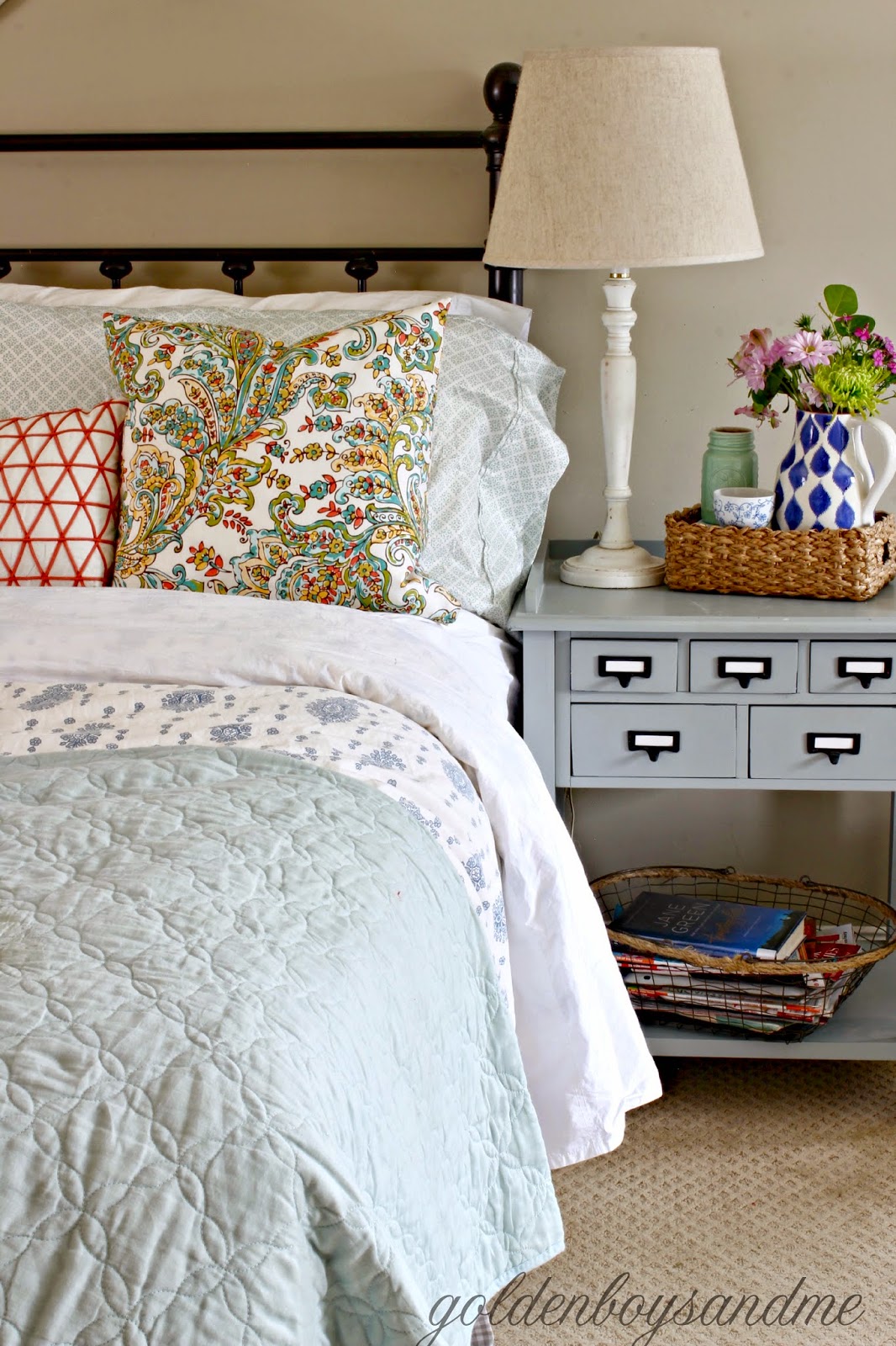 Spring master bedroom with mint and coral bedding-www.goldenboysandme.com