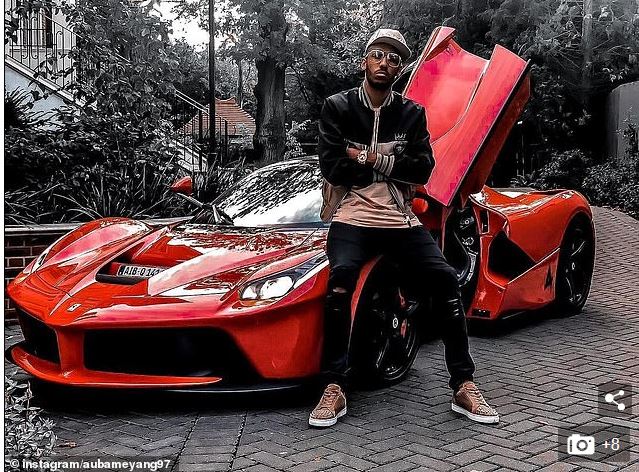  Pierre-Emerick Aubameyang shows off £1m Ferrari after scoring heroics against Leicester… before catching Mesut Ozil checking out his goal