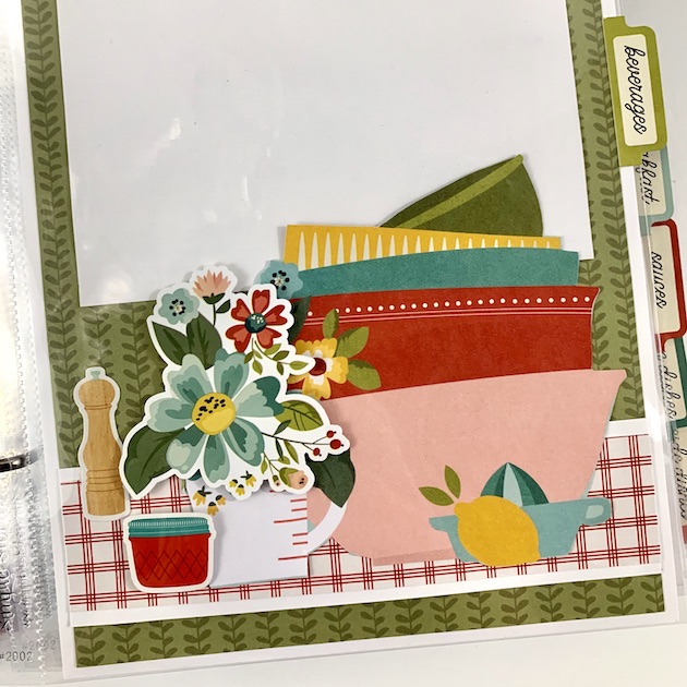 What's Cookin' Recipe Scrapbook Album page with flowers, lemmon, and kitchen supplies