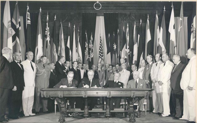 FDR and representatives of Mexico and The Philippines sign the United Nations Declaration, 14 June 1942