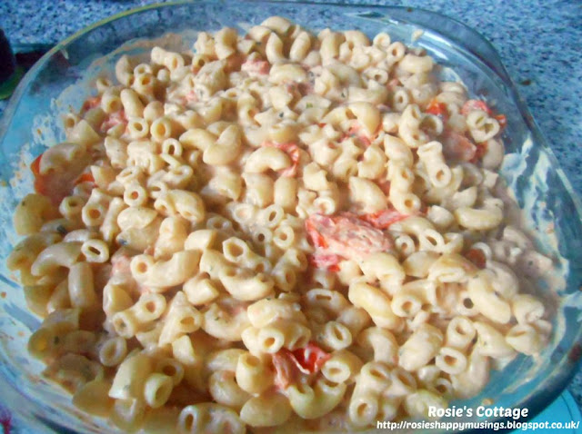 Easiest, Yummiest Pasta In The Creamiest Cheesiest Sauce... Cooked pasta is added to the creamy, cheesy sauce and stirred through until all coated.