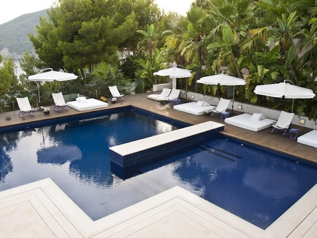 Swimming pool and the terrace with furniture 