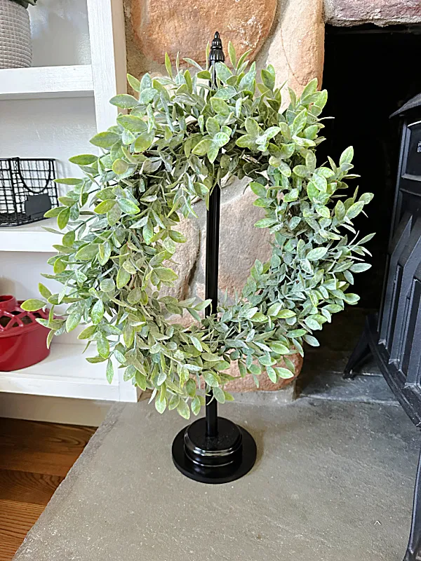 wreath on hearth on stand