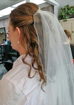 pulled back curled bridal hairstyle