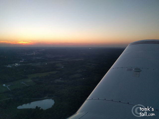 On right downwind at KLXT, coming in for a touch-and-go at sunset
