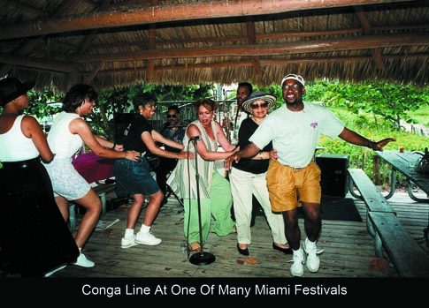<img src="image.gif" alt="This is Conga Line at One of Miami's Many Festivals" />