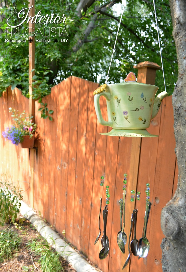 An adorable Recycled Teapot Wind Chimes idea with repurposed thrift store silverware. Budget-friendly Spring and Summer garden decor or handmade gift.