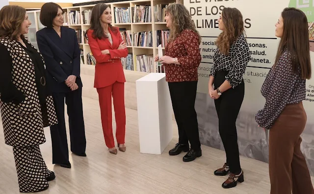 Queen Letizia wore a red longline blazer suit by Carolina Herrera, and a Cylani silk shirt by Hugo Boss. Patrizia Pepe pumps