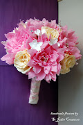 Ann liked the pink dahlia wedding bouquet that Katie had ordered earlier and . (dsc )