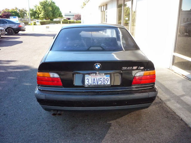 1994 BMW 325iS with peeling paint before repairs at Almost Everything Auto Body