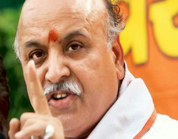 http://www.bhaskar.com/article-ht/GUJ-RAJ-pravin-togadia-attack-on-muslim-to-evict-from-hindu-areas-4588294-NOR.html