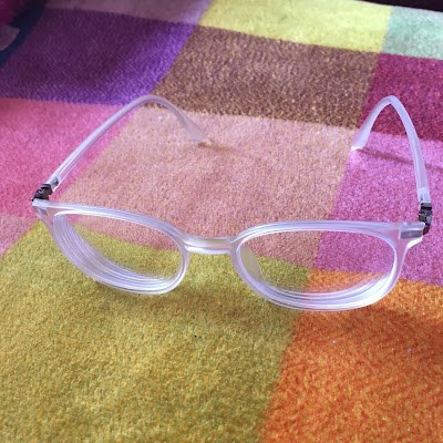 Clear glasses from Glasses Shop dot com with arms unfolded 