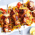 Chicken and lemongrass skewers with spiced rice 