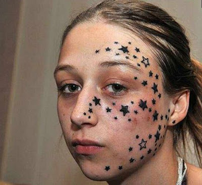 Star Tattoo On Face