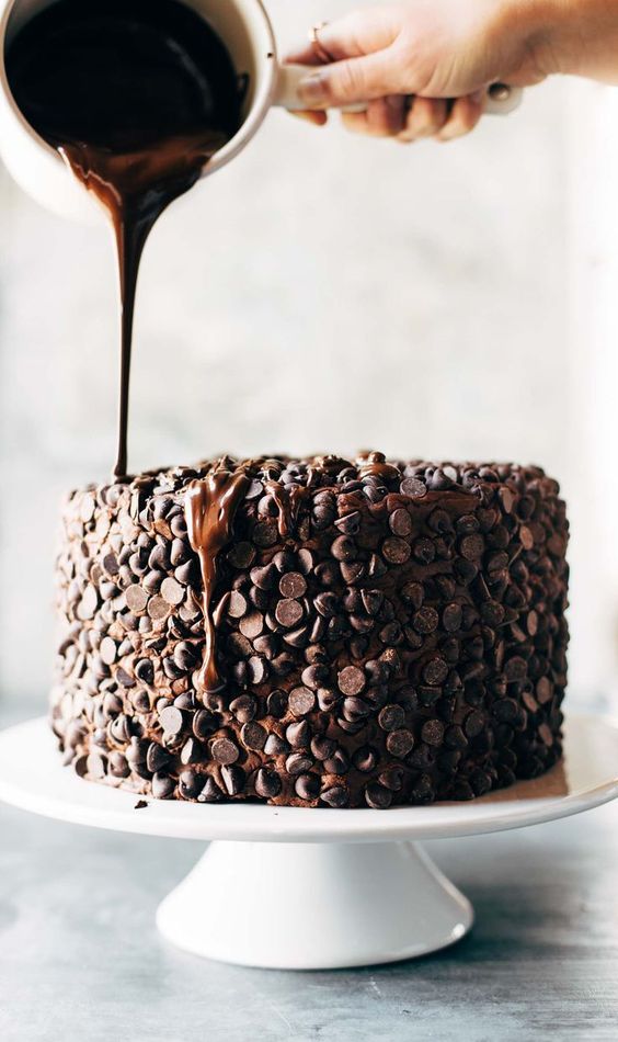 Blackout Chocolate Cake - This is the cake for chocolate lovers! Ultramoist chocolate cake, layers of cream cheese chocolate frosting, and an awesome chocolate chip + chocolate drizzle exterior. Recipe based off of this solid Chocolate Blackout Cake from Life Made Simple. Blackout Chocolate Cake - This is the cake for chocolate lovers! Ultramoist chocolate cake, layers of cream cheese chocolate frosting, and an awesome chocolate chip + chocolate drizzle exterior. Recipe based off of this solid Chocolate Blackout Cake from Life Made Simple.