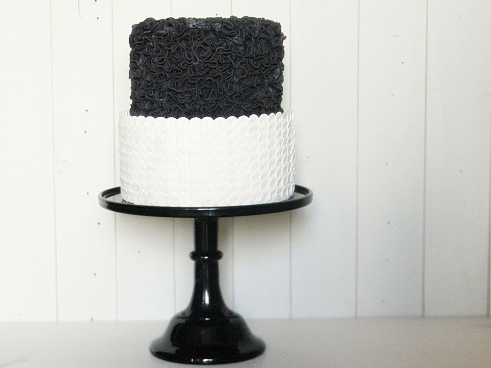 A very chic two tier black and white wedding cake from Sweet Bloom Cakes