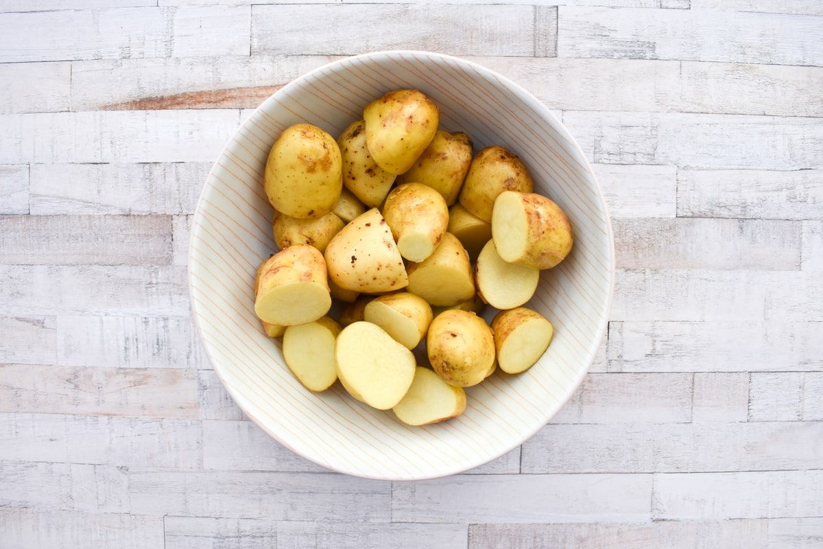 baby potatoes, halved in a bowl