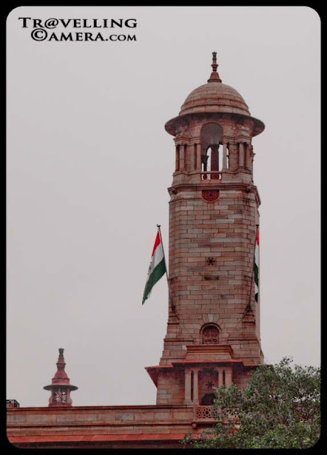 Parliament House of INDIA @ Delhi : Posted by VJ SHARMA on www.travellingcamera.com : Few Days back I was out with my friends to have lunch at Andhra-Bhavan on Ashoka Road near India Gate and crossed through Parliament house of INDIA.. Here are few photographs of surrounding places...There are lot many huge water fountains around Parliament and Rashtrapati-House...The Parliament of India is the supreme legislative body of the federal government of the Republic of India...It consists of the office of President of India and two Chambers, the House of People, known as the Lok Sabha and the Council of States, known as the Rajya Sabha.... Please see below photograph of Indian Parliament...Lot of vehicles in front of Parliament House of INDIA...The Parliament House is a circular building designed by the British architects Sir Edwin Lutyens and Sir Herbert Baker in 1912–1913... Construction began in 1921 and in 1927 the building was opened as the home of the Council of State, the Central Legislative Assembly and the Chamber of Princes...A view of Rashtrapati house from circular road around INDIA GATE...PARLIAMENT_HOUSE : The roof of the outer circle of the structure is supported by 144 granite pillars. The Houses are located on Janpath, close to the former Viceroy's House (Rashtrapati Bhavan)... It can also be seen from the India Gate...One of the pillar in President's House of INDIA..Here is another water fountains with its complete reflection...Entrance to outsiders is not allowed without official permission whether Parliament is in session or not... To obtain a visitor's pass to Parliament House Indian nationals should apply to the Parliament Secretariat and Foreign nationals have to apply through their embassies or high commissions... Visitors can enter the public galleries of the Indian Parliament with prior permission after receiving an official pass... To enter the library, an entry pass can be obtained from the Visitor's reception on Raisina Road by providing a letter of introduction from a Member of Parliament...