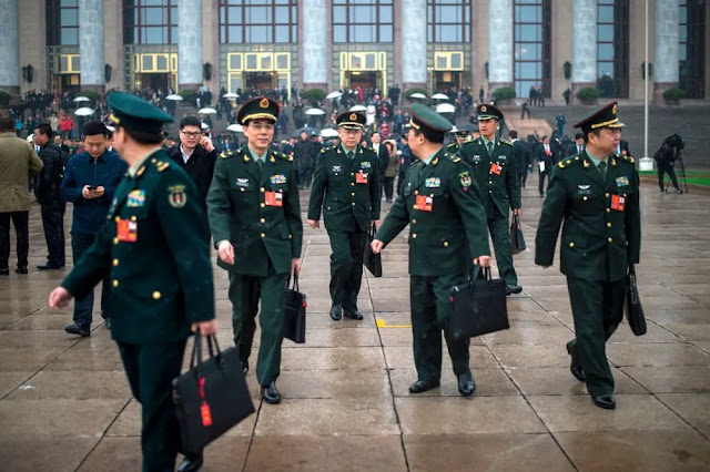 China urges military veterans to work at iPhone factory