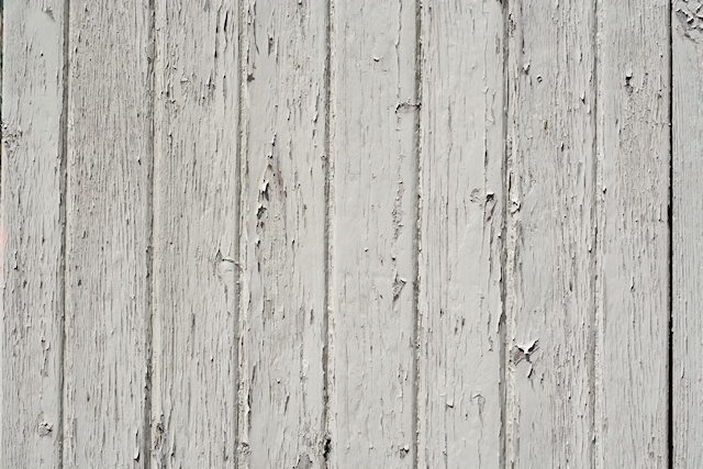 Chipped white paint on wood texture