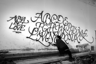 Black Font Graffiti Alphabet Tagging on the Wall