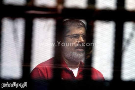 بالصور:  محاكمة الرئيس  محمد مرسى،  بـ"التخابر مع قطر". 