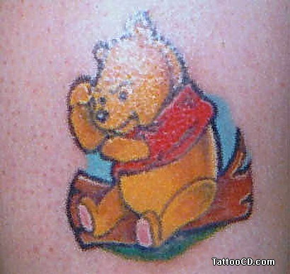 Is this a angry pooh bear tattoo? Same artist as the Woody tattoo above,