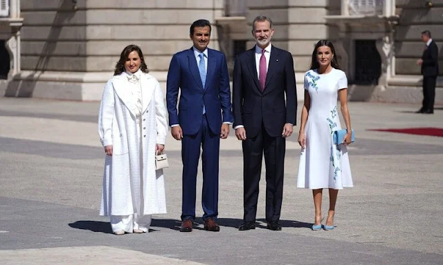 Queen Letizia wore a white Aline embroidered short sleeve dress by Carolina Herrera. Sheikha Jawaher Bint Hamad Bin Suhaim