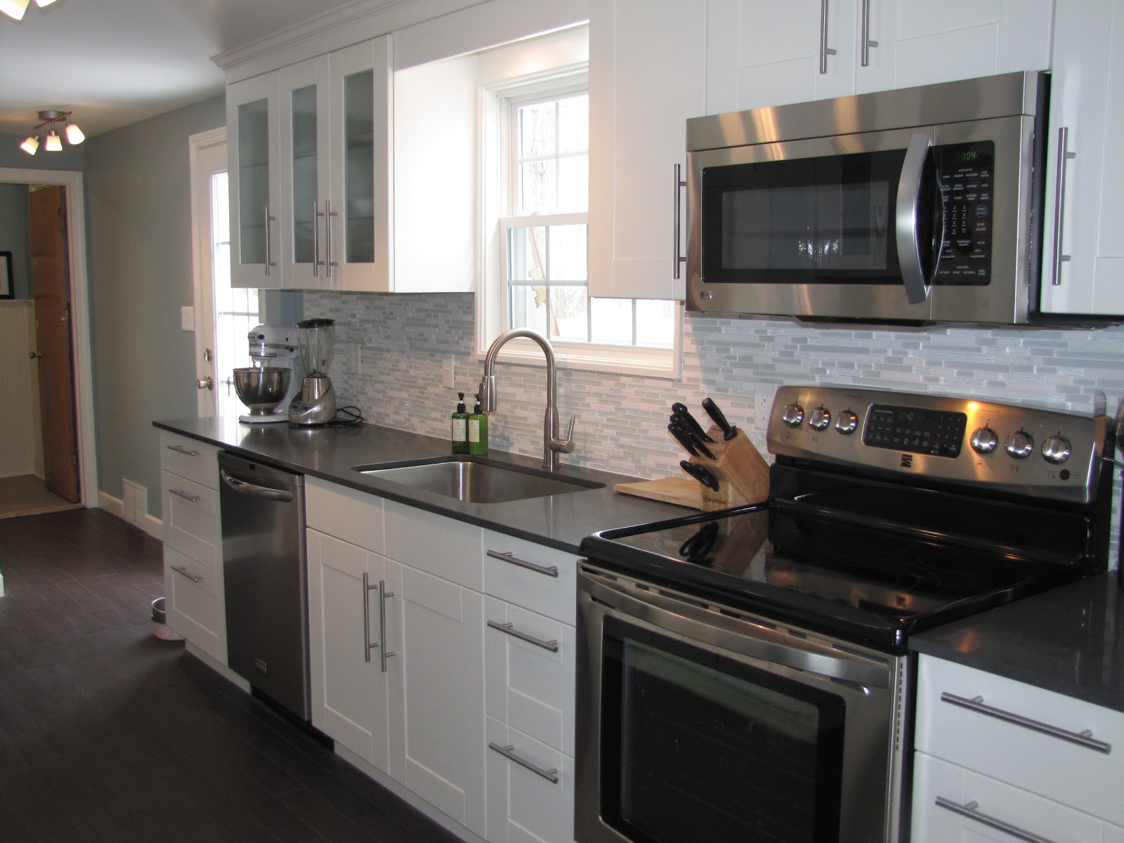White Kitchen Cabinets with Stainless Steel Appliances
