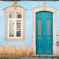 Teal door in Tavira Portugal