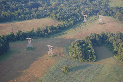 High tension towers seen from above.