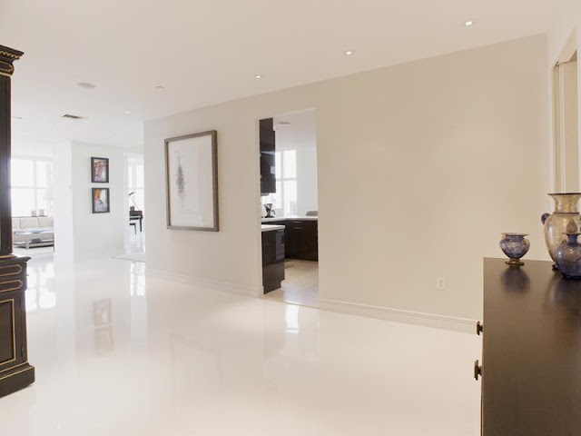 Photo of clean white hallway in New York penthouse