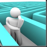 Person in Blue Labyrinth Thinking of Way Out