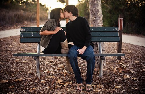 Couples sitting on bench