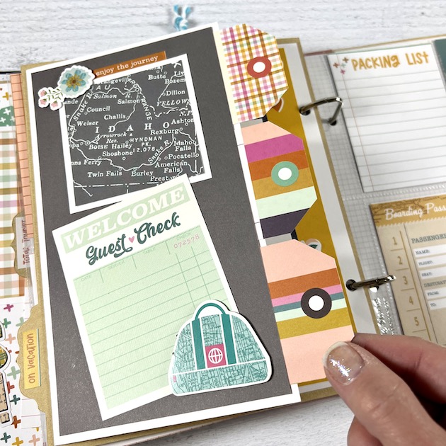 Travel Time Scrapbook layout with a map, suitcase and folding page