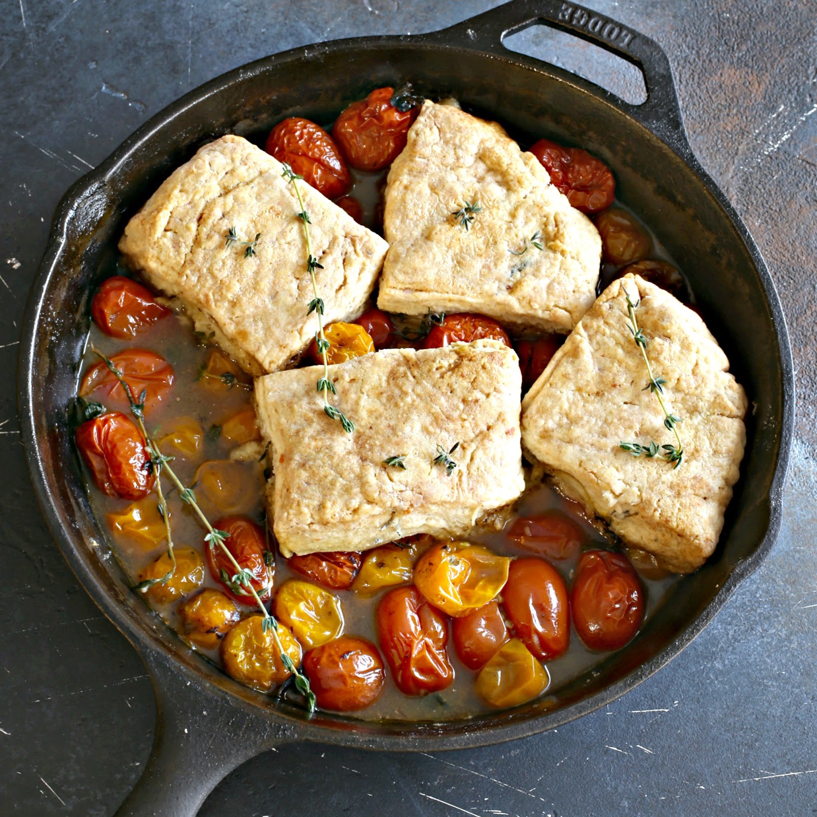 Recipe for a biscuit topped savory cobbler with tomatoes, balsamic vinegar and fresh thyme.