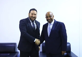 Ethiopian Minister of Education Professor Berhanu Nega shaking hands with Algerian Ambassador Dr Mohamed Khalid during bilateral meeting in Addis Ababa.