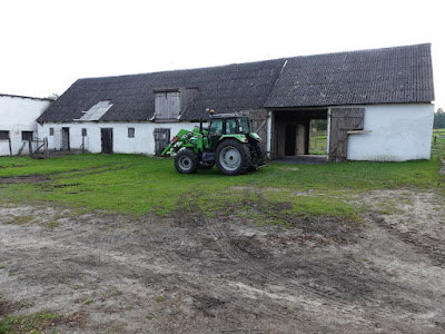 Modern equipment and well maintained older buildings on Marek’s farm