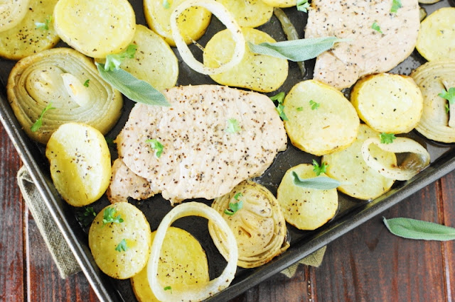 Sage Pork Chops, Potatoes & Onions Sheet Pan Supper ~ Grab your sheet pan and whip up one easy, low-maintenance, & delicious dinner!  It's the oven-roasted version of the one-pot meal.  www.thekitchenismyplayground.com