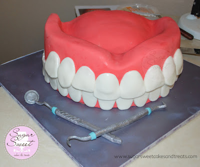 Fondant covered cake board and denture cake with tools