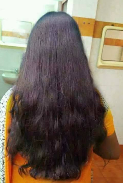 Indian Young Lady showing her waist length hair