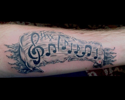 Tattoos On Music Notes Tattoo Designs 400x320px