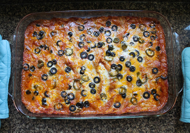 Food Lust People Love: These cheesy bean enchiladas made with pintos and refried beans are flavorful and easy to put together. They make a great vegetarian main course to serve for your Cinco de Mayo celebrations or pretty much any day of the year.