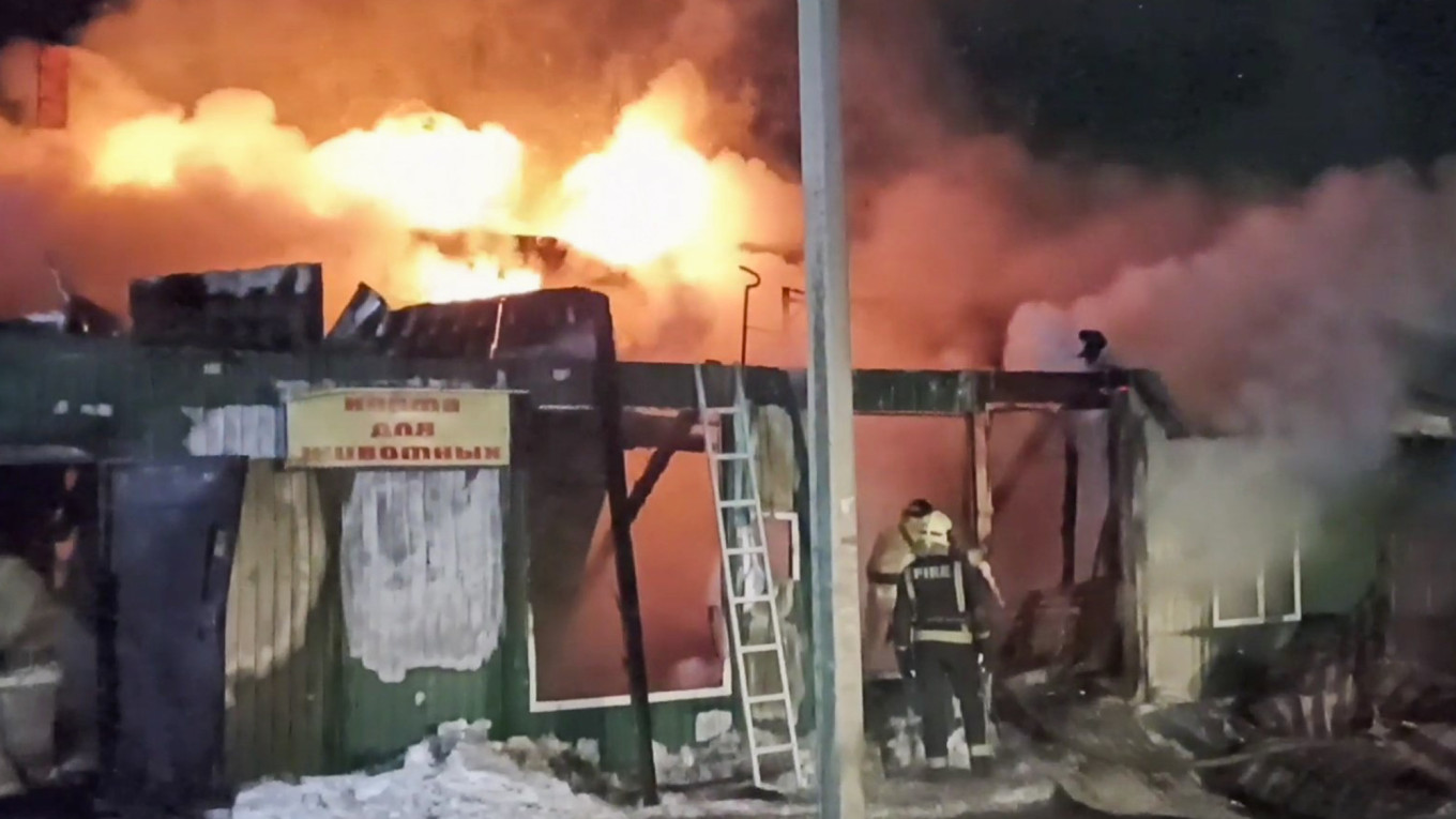 At least 20 dead in Russia illegal care home fire
